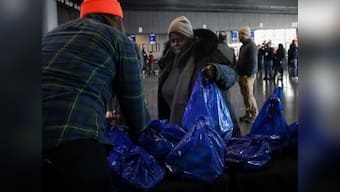 It's an end of everything, say federal workers, turn to food banks as US govt shutdown crosses one-month mark