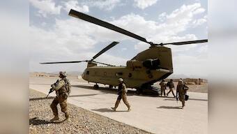 Taliban says foreign troops in Afghanistan to withdraw within 18 months as talks with US made ‘significant progress'