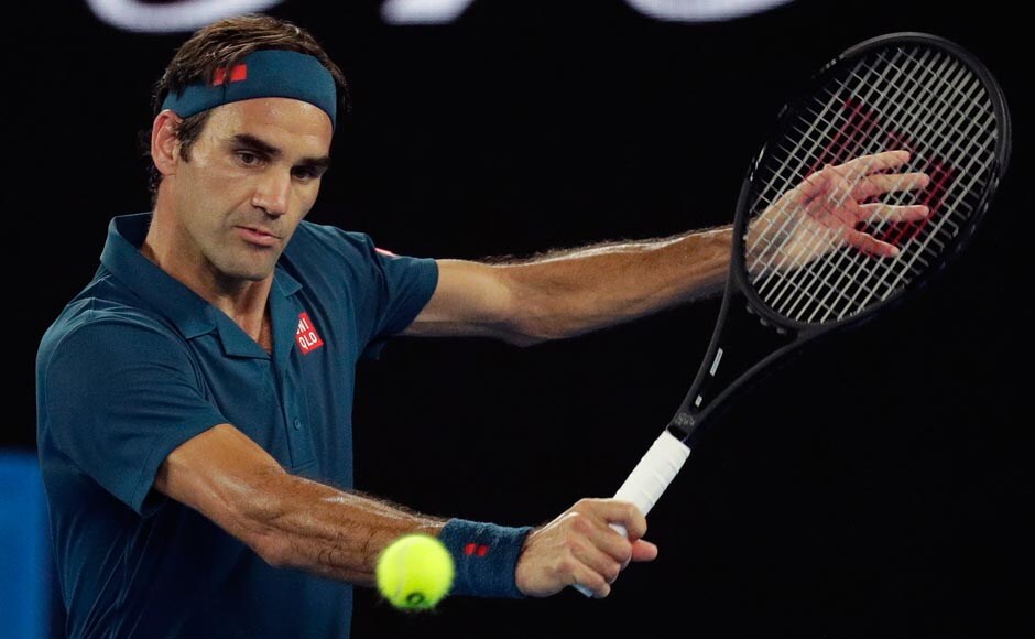 Defending champion Roger Federer served straight through Denis Istomin to win their first-round encounter at the Australian Open on Monday, securing a 6-3 6-4 6-4 victory. AP Defending champion Roger Federer served straight through Denis Istomin to win their first-round encounter at the Australian Open on Monday, securing a 6-3 6-4 6-4 victory. AP