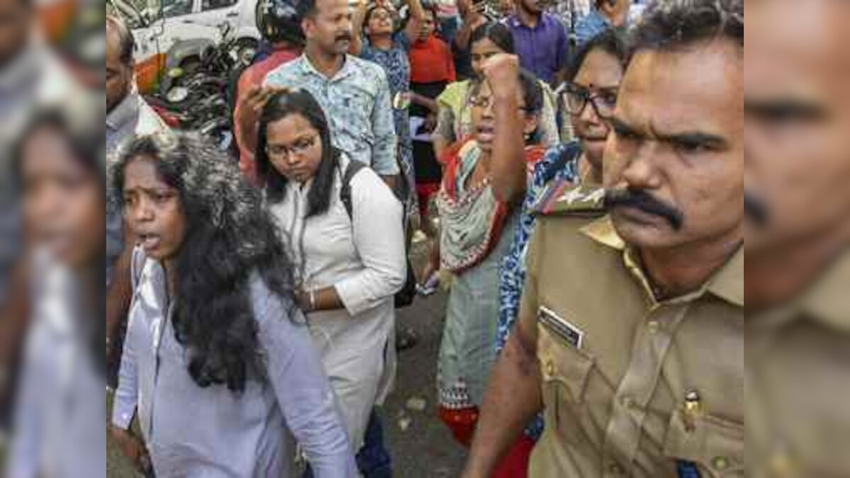 Sabarimala row: BJP workers clash with police as protests erupt across Kerala against two women's entry into Lord Ayyappa shrine