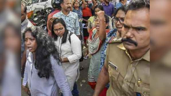 Sabarimala row: BJP workers clash with police as protests erupt across Kerala against two women's entry into Lord Ayyappa shrine