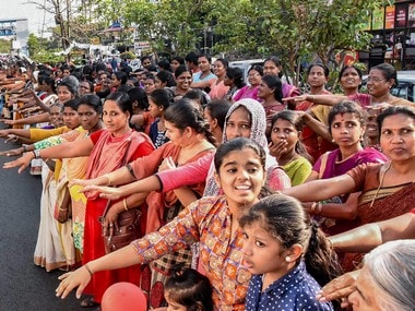 Thousands of women take pledge while participating in the 'womens wall' against communalism and gender discrimination, in Kochi. PTI