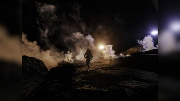 US fires tear gas across Mexico border to stop 150 migrants trying to breach fence in Tijunana; 25 travellers detained