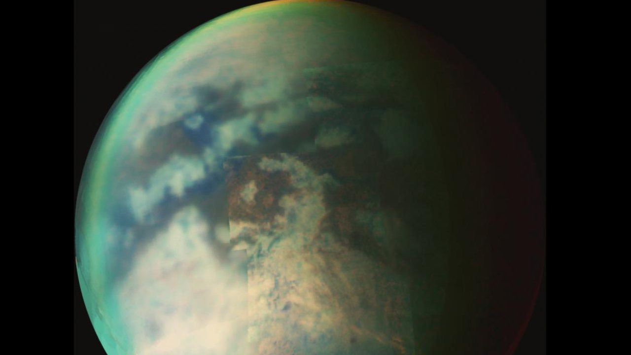 NASA's Cassini catches glimpses of fresh rainfall on Saturn's biggest moon, Titan NASA's Cassini catches glimpses of fresh rainfall on Saturn's biggest moon, Titan