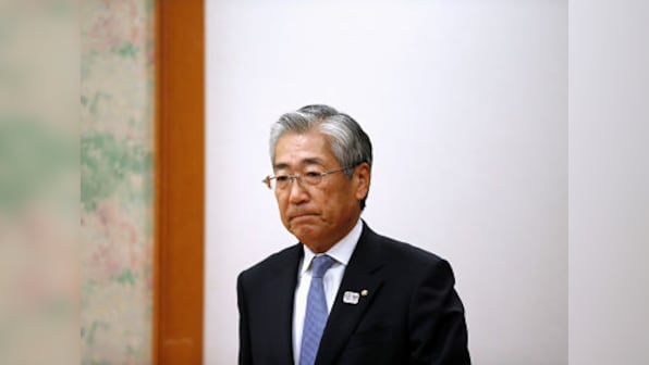 Japan's Olympic Committee chief, charged with corruption, claims he didn't know of lobby firm's links to middle man