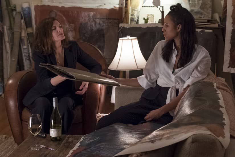 Gallery owner Rhodora Haze (Rene Russo) and her ambitious assistant Josephina (Zawe Ashton). Netflix