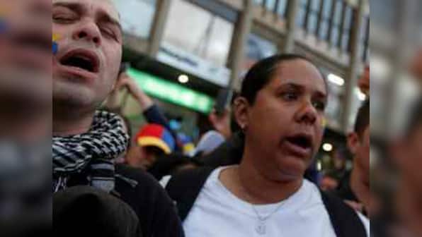 13 killed during protests against Venezuelan leftist leader Nicolas Maduro; unrest fierce in Caracas and Bolivar