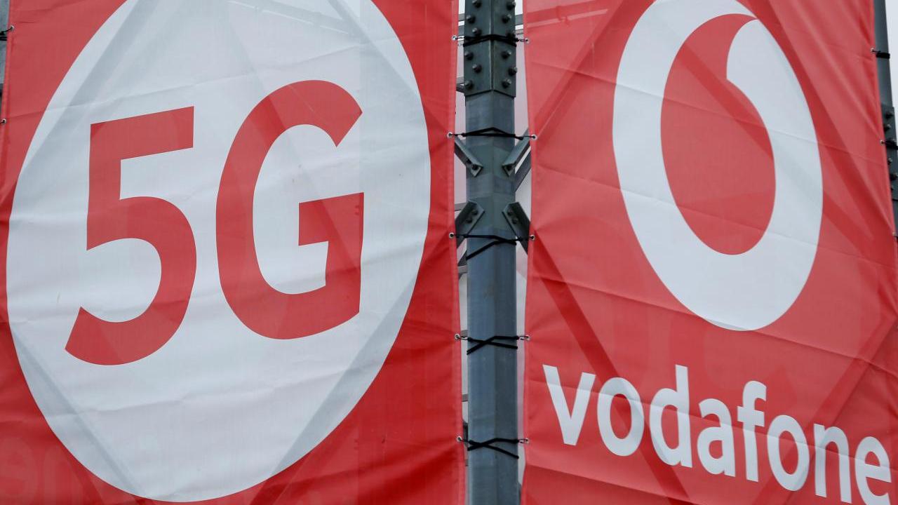 FILE PHOTO: Logos of 5G technology and telecommunications company Vodafone are pictured at the 5G Mobility Lab of Vodafone in Aldenhoven, Germany, November 27, 2018.REUTERS/Thilo Schmuelgen/File Photo