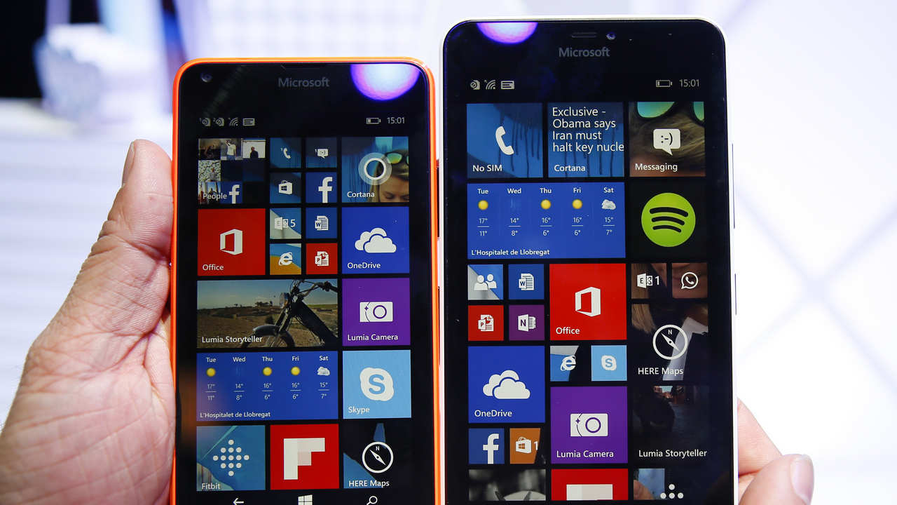 The Microsoft Lumia 640 and 640 XL are displayed during the Mobile World Congress in Barcelona March 3, 2015. Ninety thousand executives, marketers and reporters gather in Barcelona this week for the telecom operators Mobile World Congress, the largest annual trade show for the global wireless industry. REUTERS/Albert Gea (SPAIN - Tags: BUSINESS SCIENCE TECHNOLOGY BUSINESS TELECOMS) - LR2EB3315B7O2