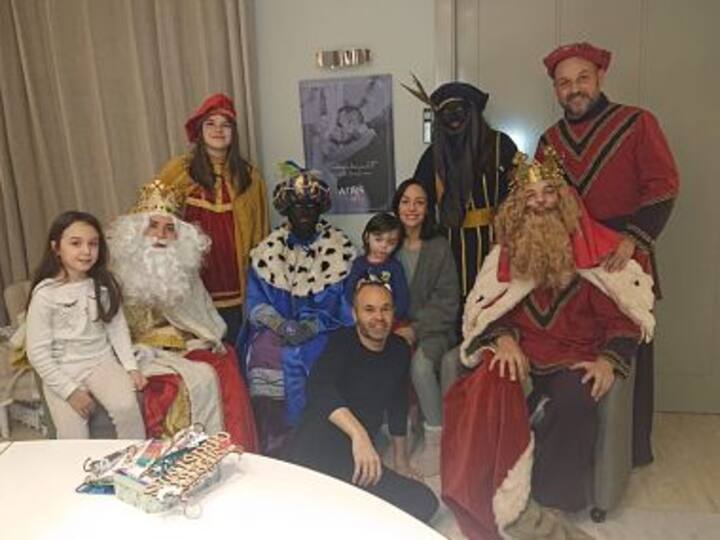 Spain football legend Andres Iniesta courts controversy after posing for picture with two friends in 'blackface'