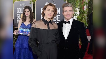 Golden Globes 2019: Fiji Water girl goes viral after photobombing celebrities on red carpet