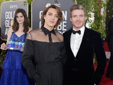 Golden Globes 2019: Fiji Water girl goes viral after photobombing celebrities on red carpet Golden Globes 2019: Fiji Water girl goes viral after photobombing celebrities on red carpet