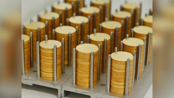 Gold rises in early trade after Fed rate cut, but pares gains as investors go for cash hunt