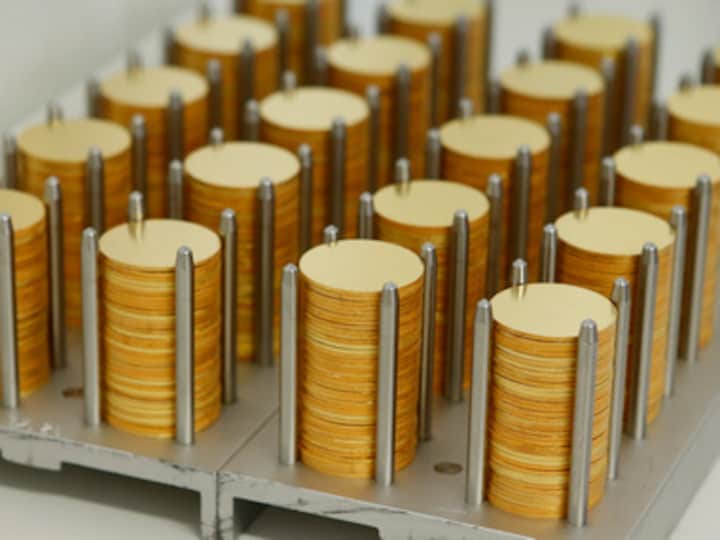Gold rises to three-month high, set for best year since 2010 on weakening dollar, year-end buys