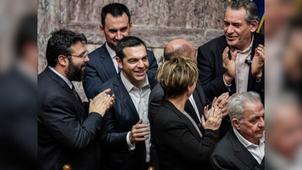 Greek prime minister wins confidence vote after row over Macedonia name deal; 151 of 299 MPs support Alexis Tsipras govt