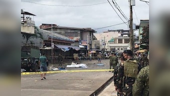 Two blasts at cathedral kill 27 in southern Philippines; targeted Jola island church hit by bombs in the past