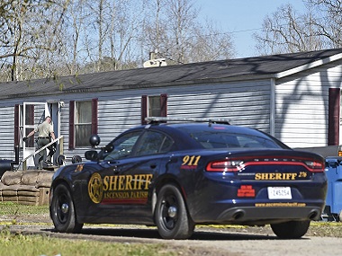 Louisiana Police search for ‘armed and dangerous’ man accused of killing his parents and three others Louisiana Police search for ‘armed and dangerous’ man accused of killing his parents and three others