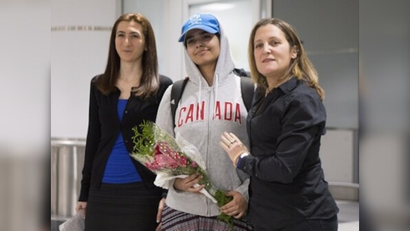 Rahaf Alqunun, teen from Saudi Arabia who fled country fearing abuse, reaches Toronto after Canada grants her asylum