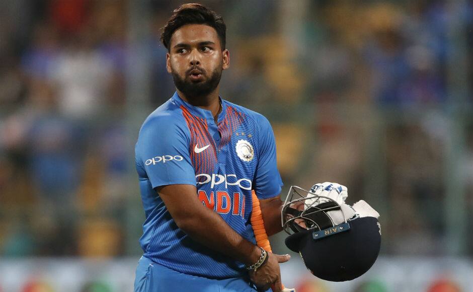 Rishabh Pant walks back after being dismissed for 1. AP