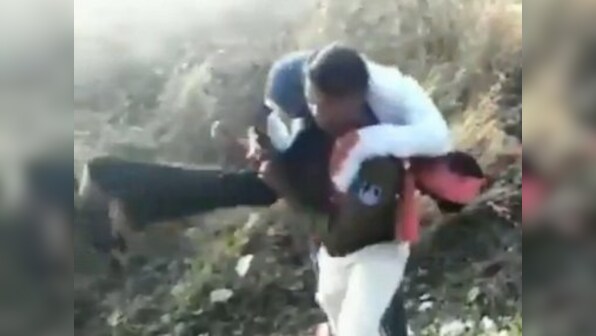 Watch: Madhya Pradesh Police constable carries man who fell off train for one-and-a-half km to nearby station, saves life