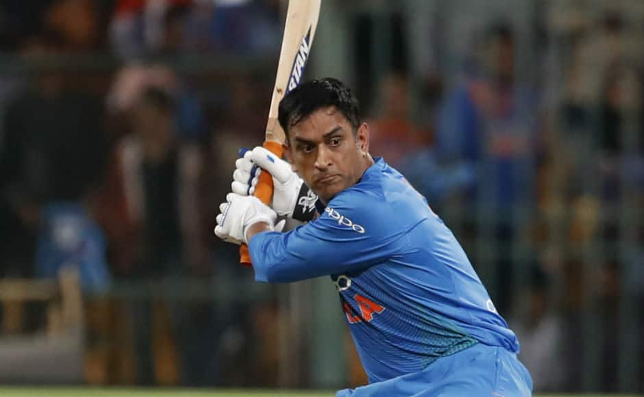 MS Dhoni struck a few lusty blows on his way to a 23-ball 40. AP