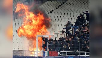 UEFA order AEK Athens to play two games behind closed doors after fans wreak havoc in Champions League fixture against Ajax
