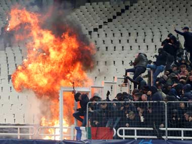 UEFA order AEK Athens to play two games behind closed doors after fans wreak havoc in Champions League fixture against Ajax UEFA order AEK Athens to play two games behind closed doors after fans wreak havoc in Champions League fixture against Ajax