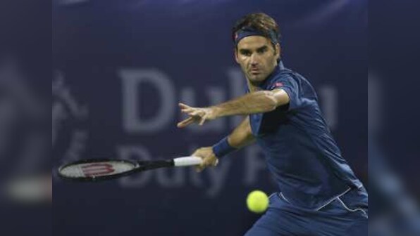 Dubai Tennis Championships: Roger Federer begins quest for 100th career title with win over Philipp Kohlschreiber