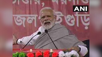 Narendra Modi in West Bengal: Mamata Banerjee sat on dharna 'to protect those who looted people', says PM
