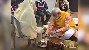 By washing feet of sanitation workers, Narendra Modi delivers message of inclusivity as well as blow to Opposition's politics