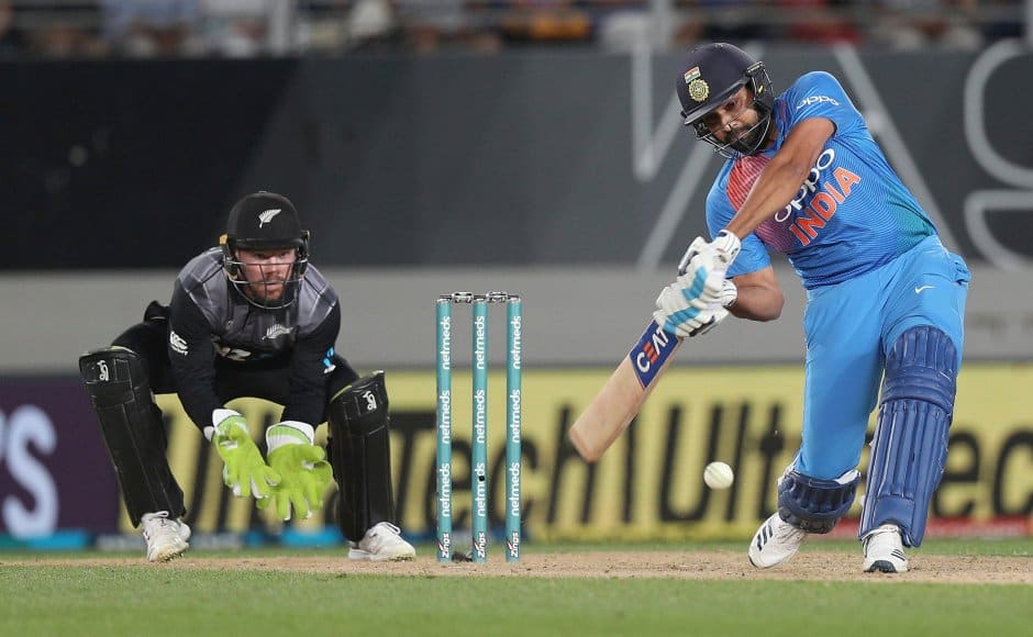 India’s Rohit Sharma bats fielded by wicketkeeper New Zealand’s Tim Seifert during their twenty/20 cricket international at Eden Park in Auckland, New Zealand, Friday, Feb. 8, 2019. (AP Photo/David Rowland)