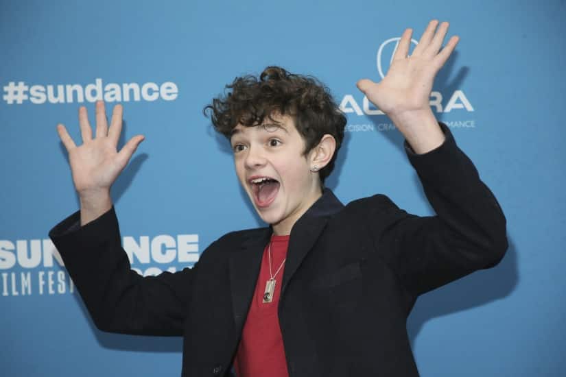 Actor Noah Jupe waves at the premiere of 