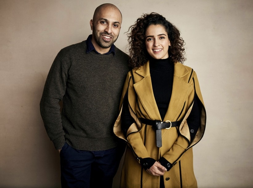 Writer/director Ritesh Batra, left, and Sanya Malhotra pose for a portrait to promote the film "Photograph" at the Salesforce Music Lodge during the Sundance Film Festival on Sunday, Jan. 27, 2019, in Park City, Utah. (Photo by Taylor Jewell/Invision/AP)