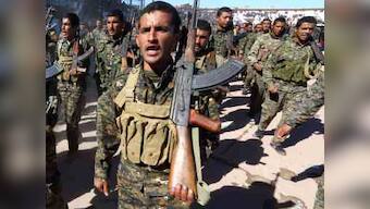 US-backed Syrian Democratic Forces launch 'final battle' against IS; 20,000 civilians evacuated from target near Iraq border