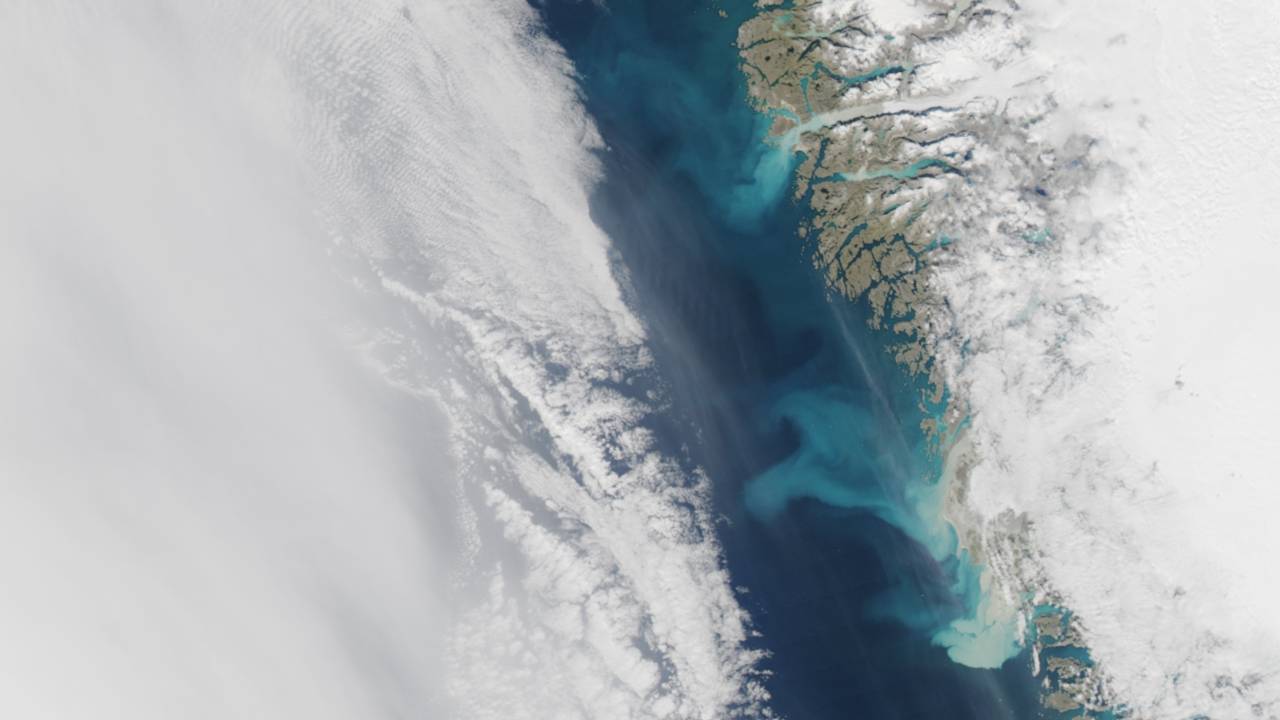 Greenland's snow-laden hills are slowly giving way to sand-covered beaches Greenland's snow-laden hills are slowly giving way to sand-covered beaches