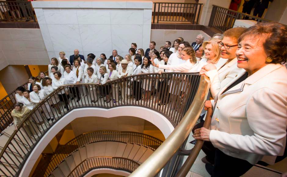 Pelosi and all the other women of the House wore white for the occasion, as a mark of respect for suffragists who won the right to vote. A few of the Democrats' male colleagues joined them in white. Many other men wore white ribbons of support. AP Pelosi and all the other women of the House wore white for the occasion, as a mark of respect for suffragists who won the right to vote. A few of the Democrats' male colleagues joined them in white. Many other men wore white ribbons of support. AP