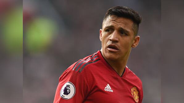 Premier League: Liverpool go top after stalemate at injury-hit Manchester United; Alexandre Lacazette helps Arsenal win