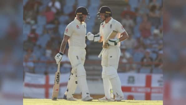 West Indies vs England: Jos Buttler, Ben Stokes lead tourists' recovery with unbeaten century stand on opening day of third Test