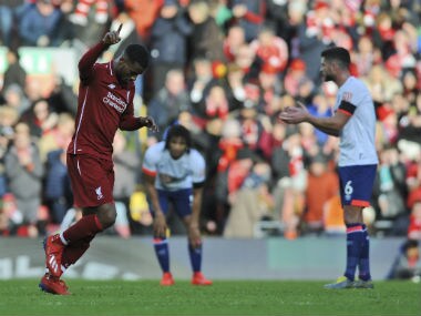 Liverpool's Georginio Wijnaldum celebrates after scoring his side's second goal against Bournemouth on Saturday. AP