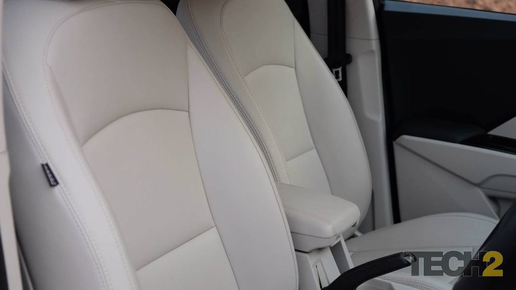 The centre console on the XUV wears a touchscreen infotainment system flanked by AC vents and controls for a dual-zone climate control system.