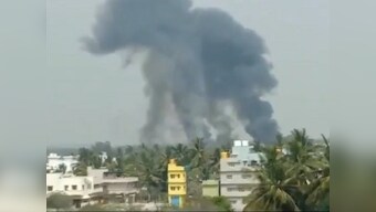 One pilot dead after two IAF Surya Kiran jets crash mid air during rehearsal for Aero India show; one civilian injured