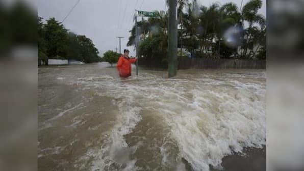 Australia's military steps in to tackle ‘once in a century’ floods as downpour causes damage to property, brings crocs into streets
