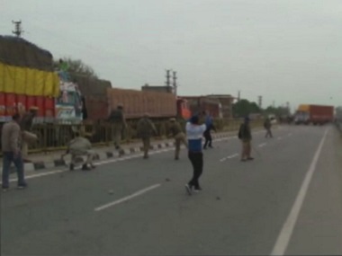 Gujjar quota stir: Protest turns violent in Rajasthan's Dholpur as demonstrators pelt stones, set police vehicle on fire Gujjar quota stir: Protest turns violent in Rajasthan's Dholpur as demonstrators pelt stones, set police vehicle on fire