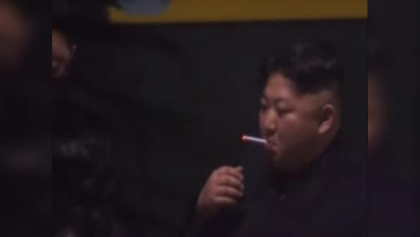 Kim Jong-un spotted smoking cigarette hours before arrival in Vietnam for summit with Donald Trump