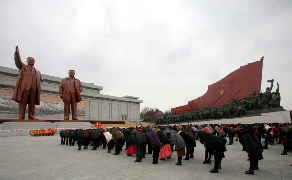 In North Korea's Pyongyang, people paid tribute to the late leaders, Kim Il Sung and his son Kim Jong Il, after laying bouquets of flowers on Tuesday. AP In North Korea's Pyongyang, people paid tribute to the late leaders, Kim Il Sung and his son Kim Jong Il, after laying bouquets of flowers on Tuesday. AP