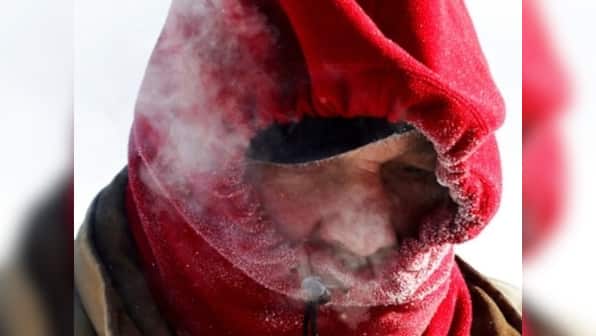 From long johns to short sleeves: US polar vortex likely to end with rapid thaw; melting snow may lead to flooding in Michigan