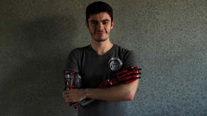 Teen builds for himself a robotic, colourful prosthetic arm using Lego pieces