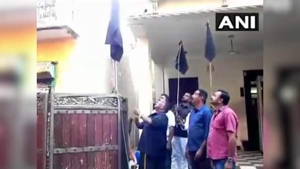 On 6th day of protest against Kiran Bedi, Puducherry CM V Narayanaswamy hoists black flag at residence
