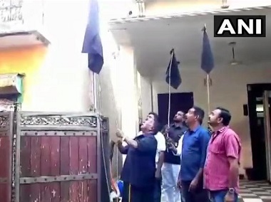 On 6th day of protest against Kiran Bedi, Puducherry CM V Narayanaswamy hoists black flag at residence On 6th day of protest against Kiran Bedi, Puducherry CM V Narayanaswamy hoists black flag at residence