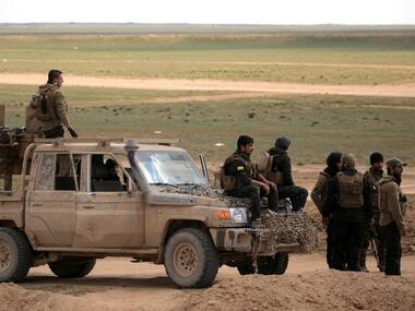 Hundreds flee as US-backed Syrian forces battle for last Islamic State bastion Baghouz bordering Iraq